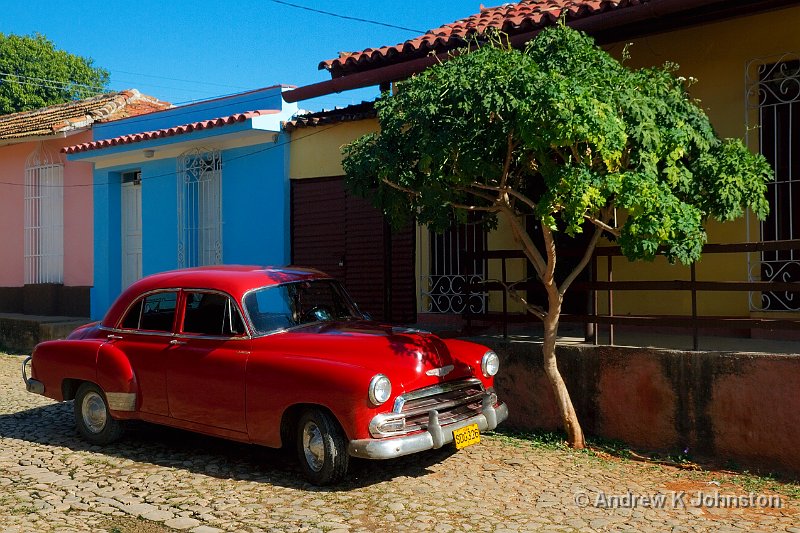 1110_7D_3951.jpg - Red car and blue building, Trinidad