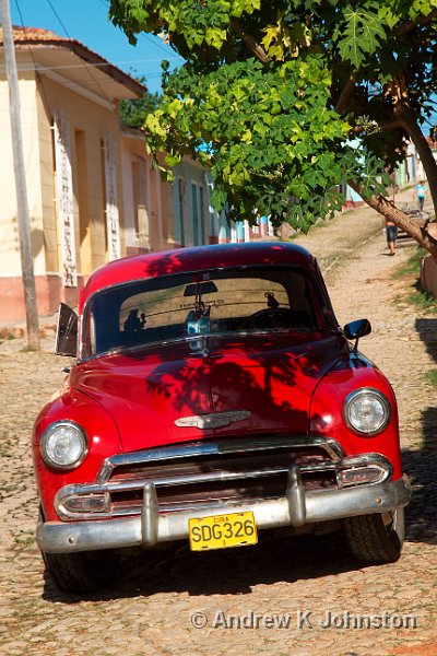 1110_7D_3954.JPG - Red car and tree shadow, Trinidad