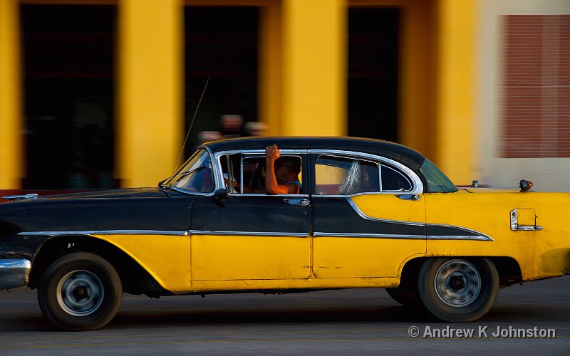 1110_7D_4176.JPG - Black and yellow car with matching background on the Malecon, Havana