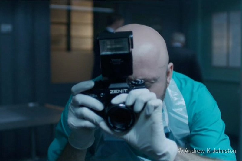 Whitechapel.jpg - Mortuary technician in Whitechapel, set in 2012, with a rather suprising camera choice!