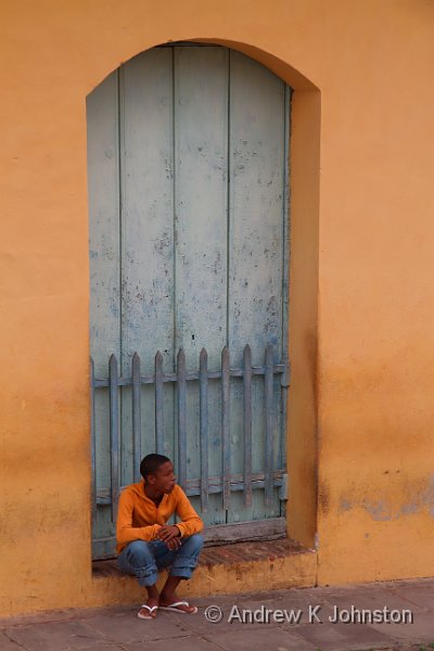 1110_7D_3822.jpg - Boy in a doorway, Trinidad, Cuba